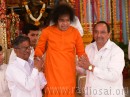 12. Sri Kondal Rao on the left and Sri Ramakrishna with Swami